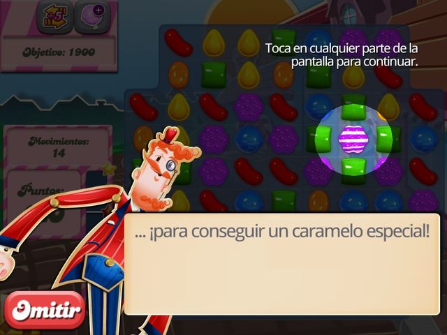Nivel 2 de candy crush. Es tutoríal mostrando el caramelo rayado.